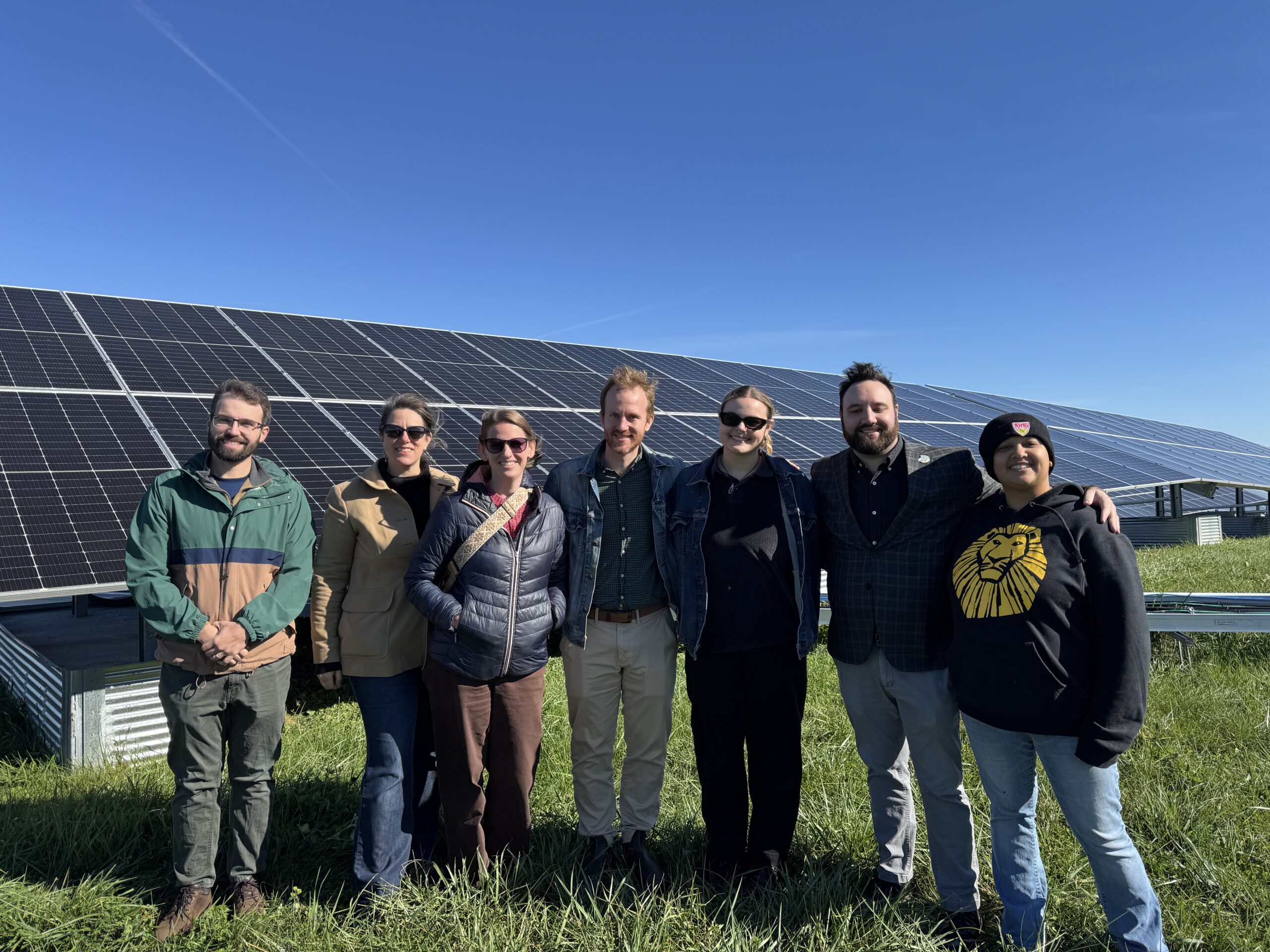 EnergySmart CNY Staff in front of Solar Array in Manlius, NY