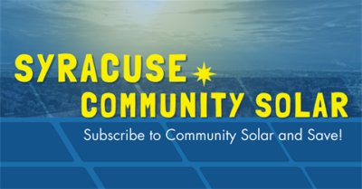 11Yellow letters saying "Syracuse Community Solar - Subscribe to Community Solar and Save!" over a background of a sunny sky and solar panels